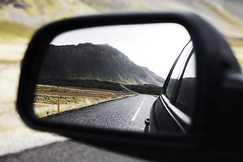 black wing mirror showing road, close-up photo of black vehicle side mirror reflecting road HD wallpaper