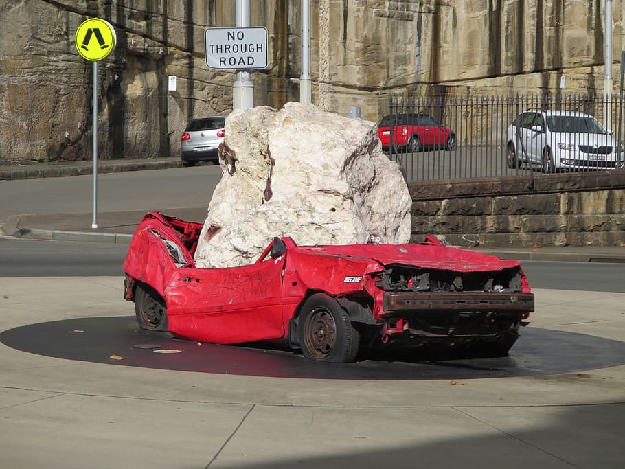 red coupe smashed by gray boulder on gray concrete road, Car Crash HD wallpaper