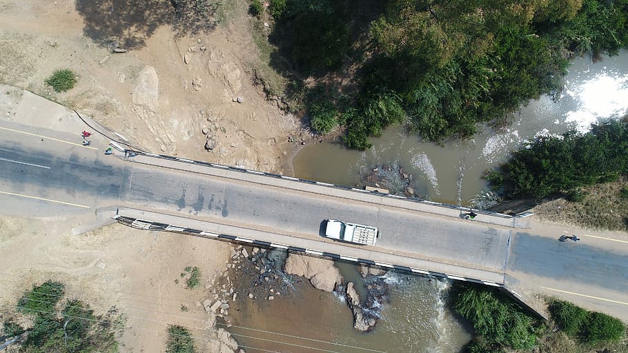 RUAHA NATIONAL PARK  TOUR, aerial photography of white vehicle on road at daytime HD wallpaper