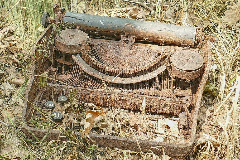 rusted vintage brown typewriter, old, rots, nature, environment HD wallpaper