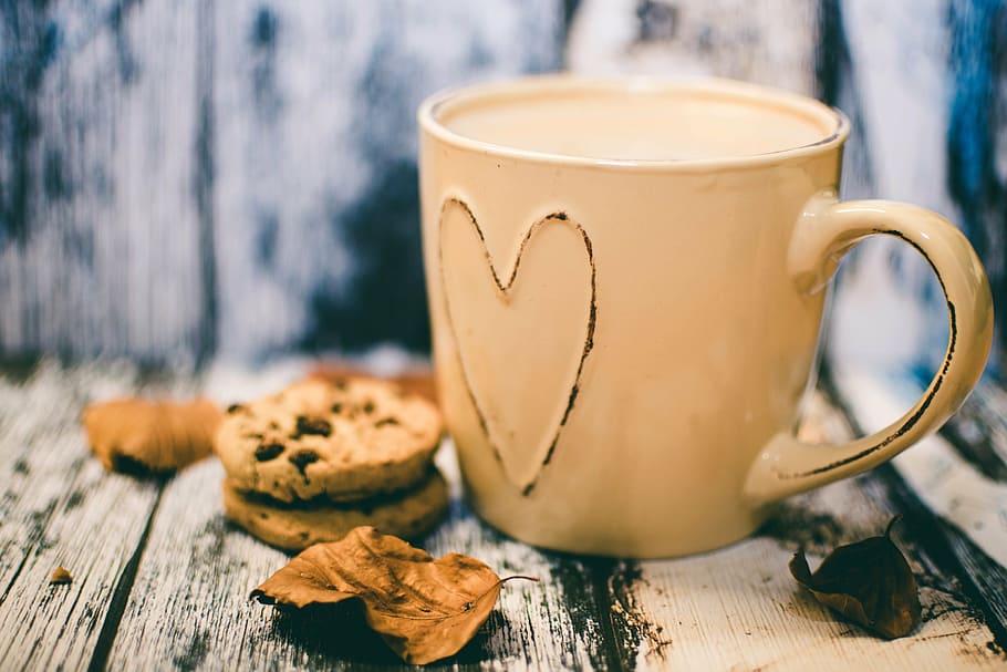 yellow ceramic mug beside cookies macro photography, breakfast HD wallpaper