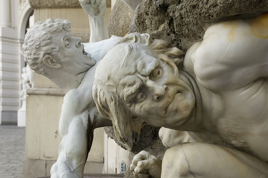 focus photo of two human statues, vienna, austria, sculpture