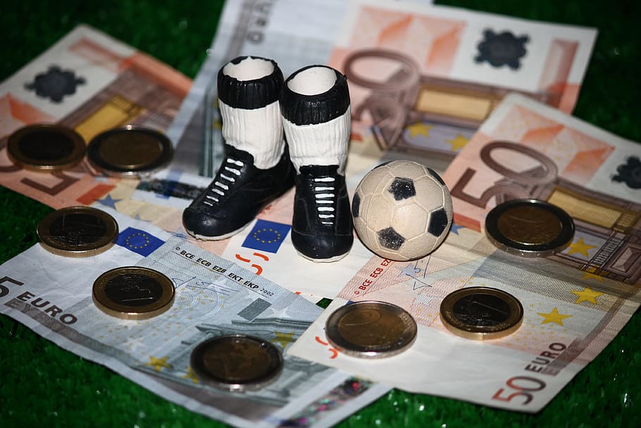 HD wallpaper: white-and-black boots beside soccer ball miniature, Football - Wallpaper Flare