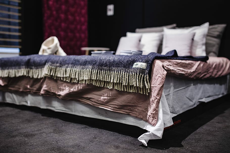 Beds with pillows on a designer exhibition, furniture, room, home