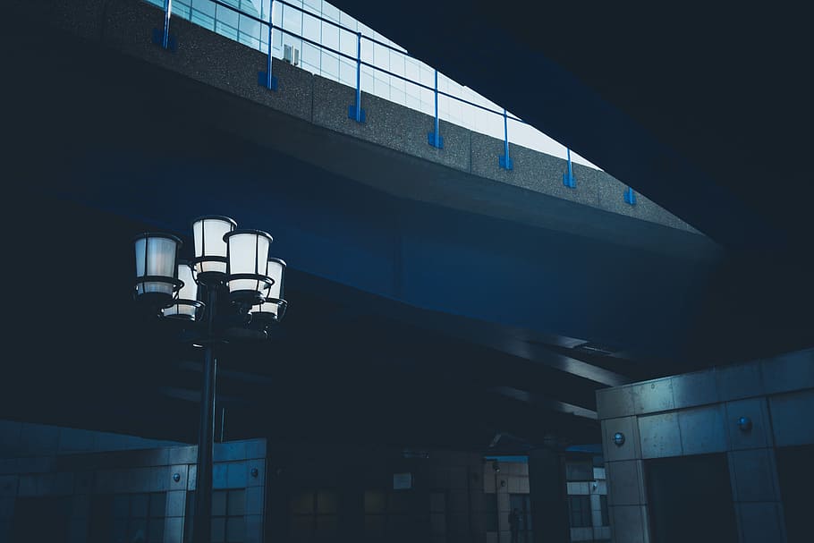 turned on floor lamp beside building, turned on black lamppost HD wallpaper