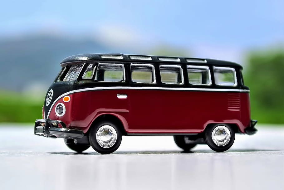close-up photo of red and black Volkswagen T2 die-cast model HD wallpaper