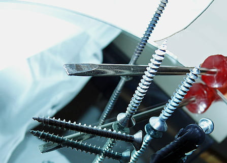 red handled slot-head screwdriver and screws on table, dowel HD wallpaper
