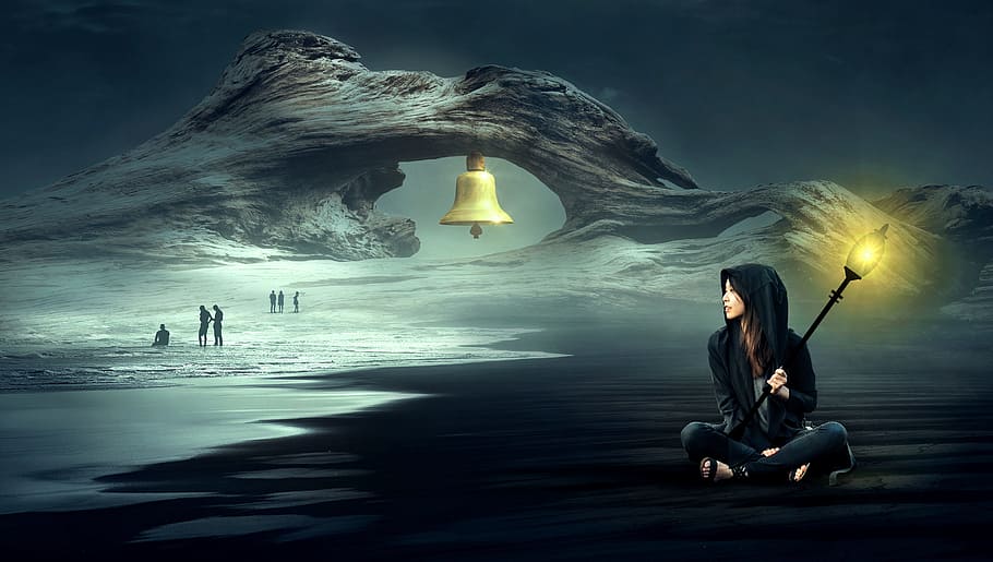 woman holding light post sitting on beach sand, fantasy, atmosphere