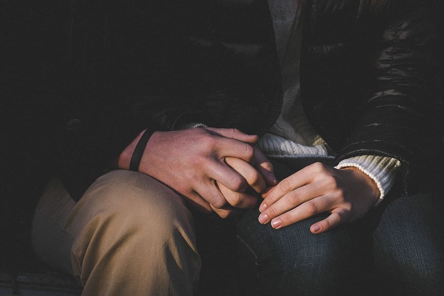 person wearing black jacket, hand, holding, dark, human hand HD wallpaper