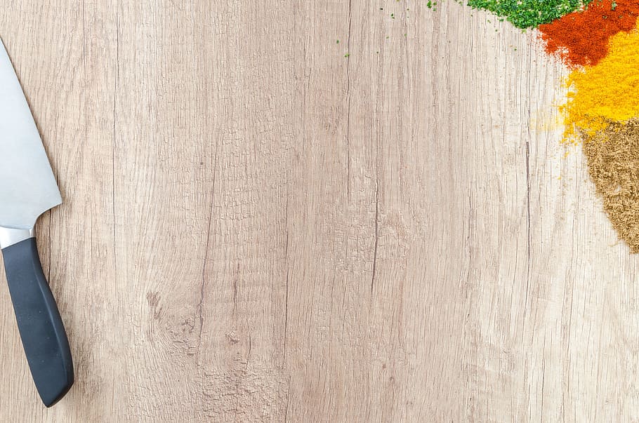 grey cutting knife placed on brown wooden surface, turmeric HD wallpaper