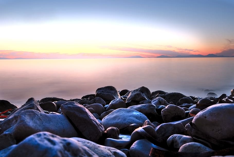 sunset, rocks, sea, sky, water, scenics - nature, solid, beauty in nature HD wallpaper