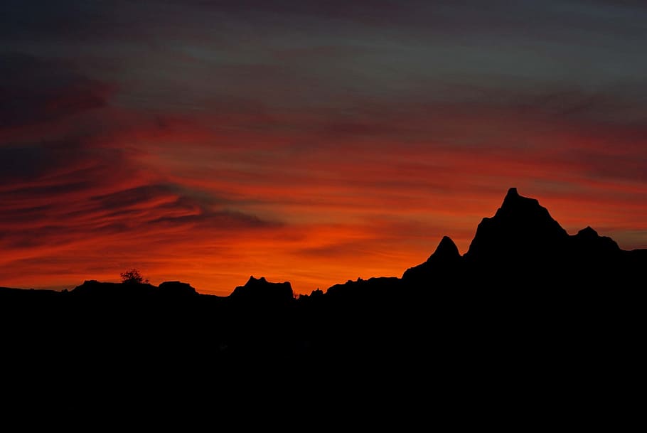 silhouette of mountain under orange skies, sunset, landscape HD wallpaper