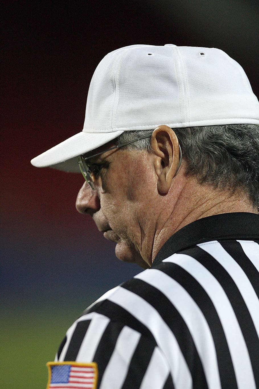 HD wallpaper: man wearing black and white striped referee shirt and cap  standing on field during daytime