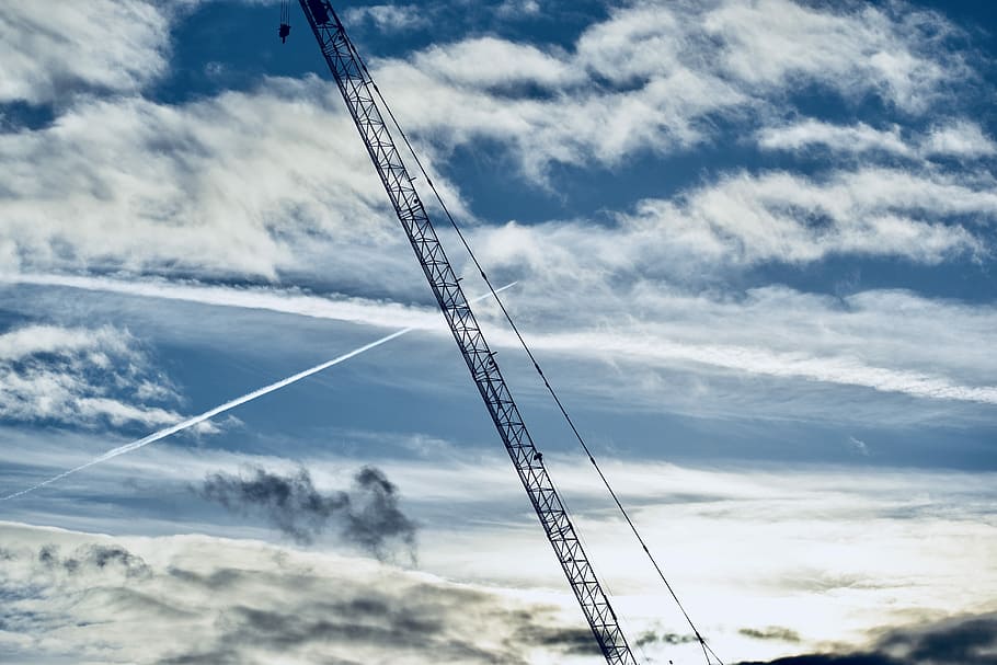 black metal heavy equipment under blue sky, silhouette of crane HD wallpaper