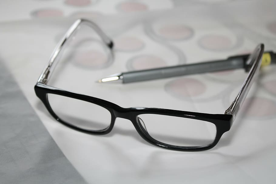 black framed eyeglasses near gray pen on white printer paper HD wallpaper