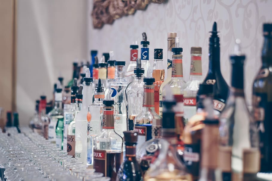 assorted labeled glass bottle lot, amber glass and clear glass bottle lot HD wallpaper