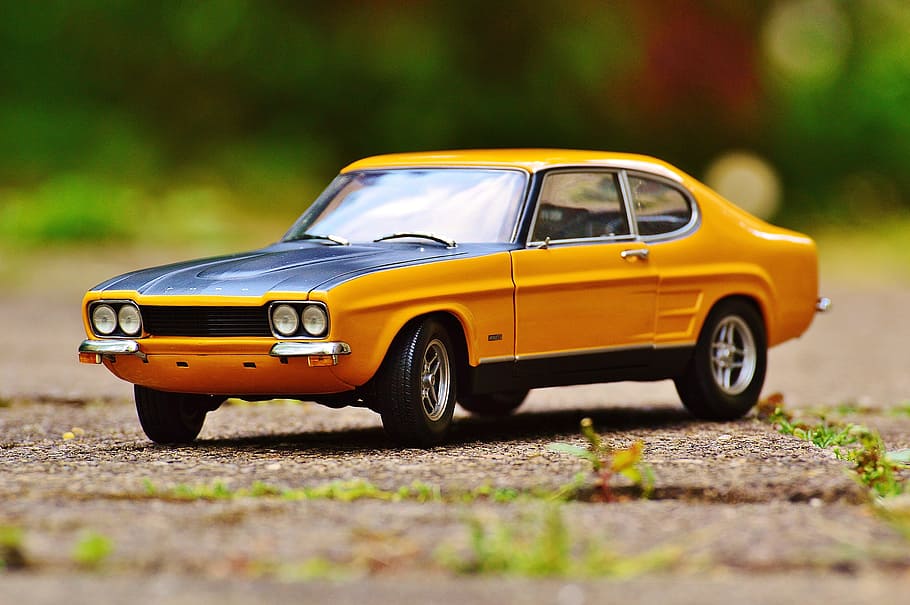 selective focus photo of classic yellow coupe scale model, capri HD wallpaper