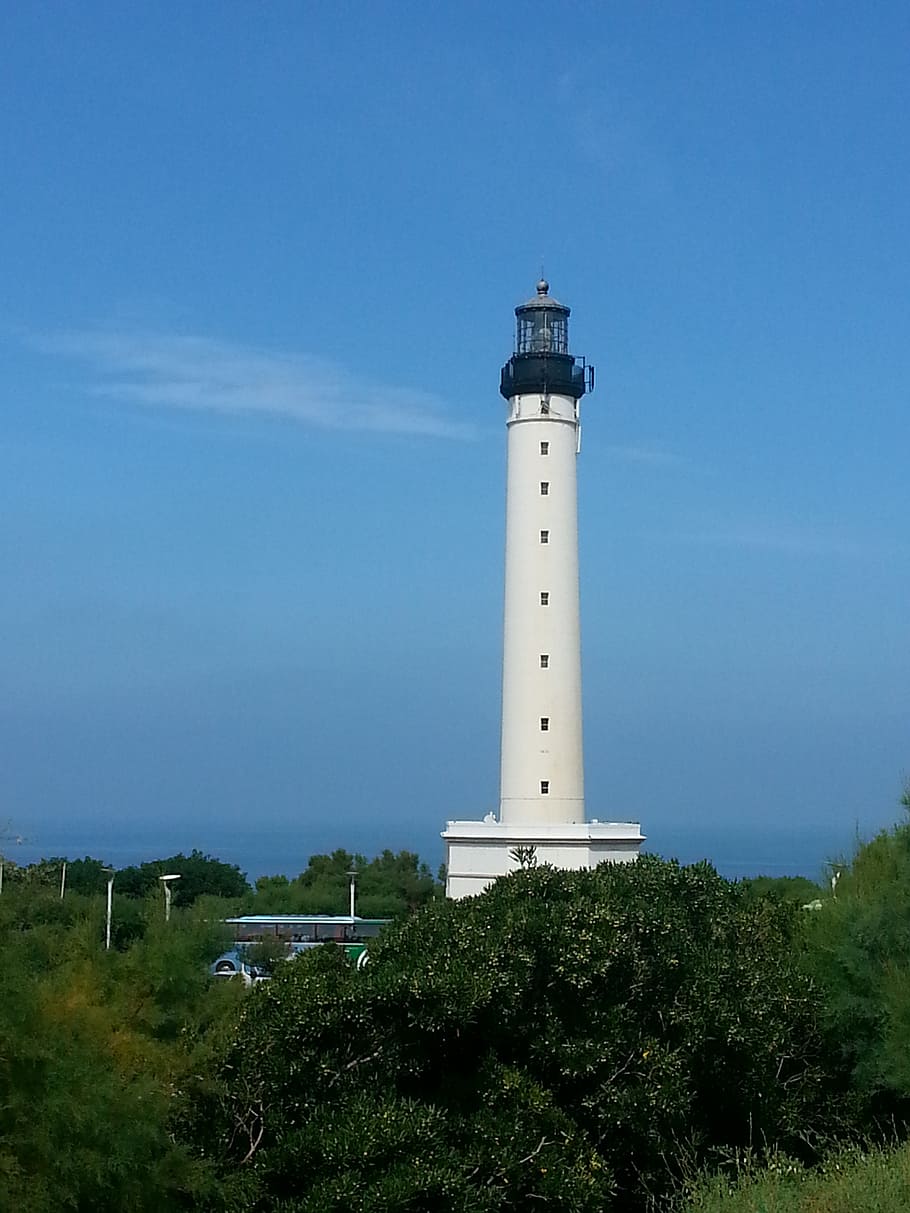 lighthouse, blue sky, side, ocean, holiday, sea, tower, architecture HD wallpaper