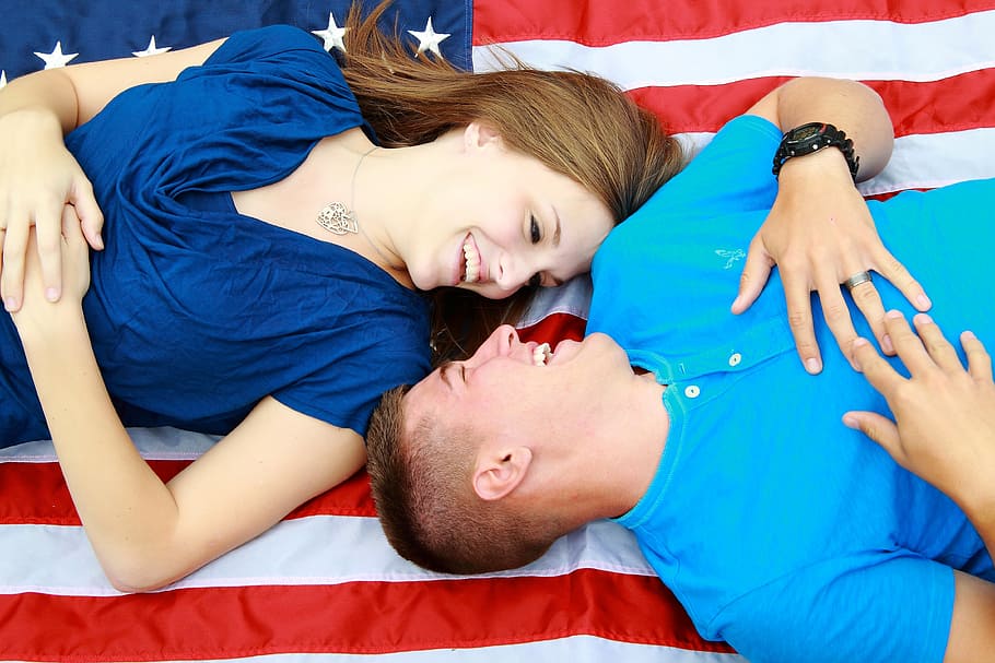 man and woman lying on US flag, couples, people talking, happy couples, HD wallpaper