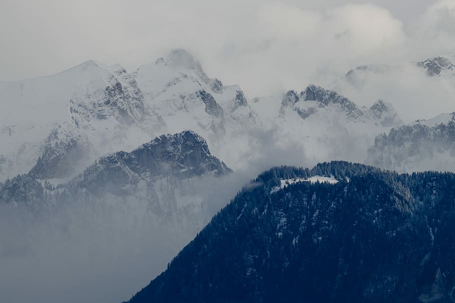 gray snow-covered mountain, snow capped mountain covered with fogs HD wallpaper