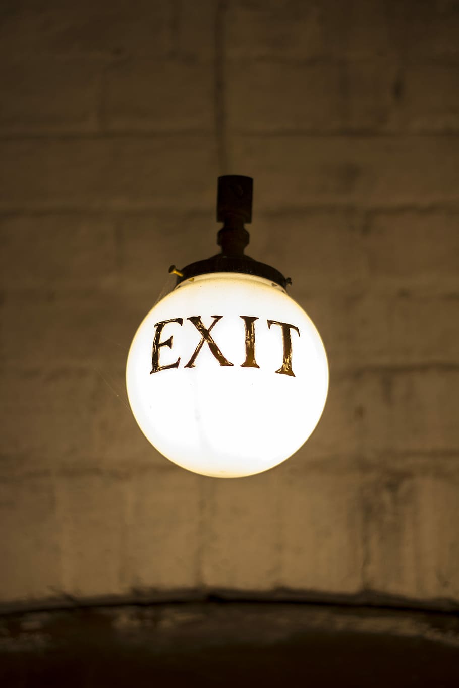 closeup photography of white hanging bulb light with exit signage, white light bulb HD wallpaper