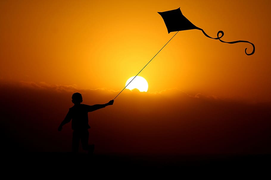 silhouette of child playing kite, boy, dragon, dragon flight