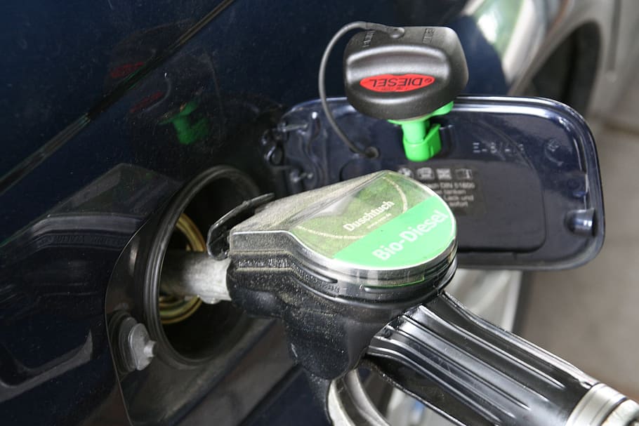 black gas pump in vehicle gas tank, refuel, auto, petrol stations HD wallpaper