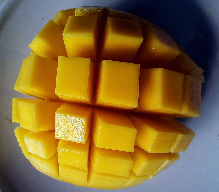 sliced mango fruit, mango cut open, opened mango fruit, juicy HD wallpaper