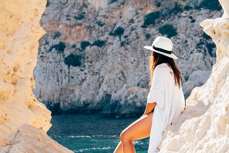 Rear View of Woman Sitting on a rock, adventure, arch, back view HD wallpaper