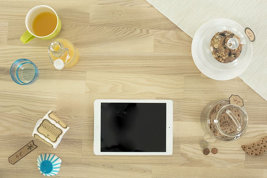 white Android smartphone near clear glass jar, objects, table HD wallpaper
