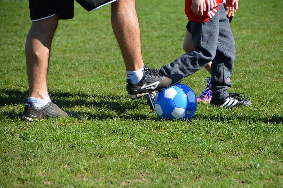 HD wallpaper: person stepping on soccer ball, children, football, attack, defense - Wallpaper Flare