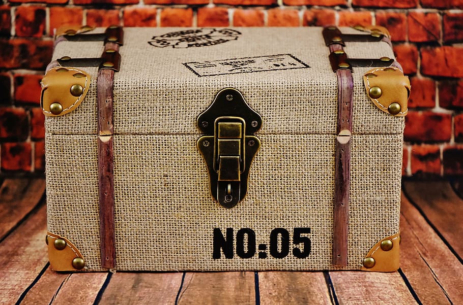 gray and brown chest box near brown wall bricks, closure, fitting HD wallpaper