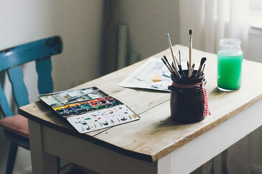 Paints and brushes on table, objects, creativity, indoors, desk HD wallpaper