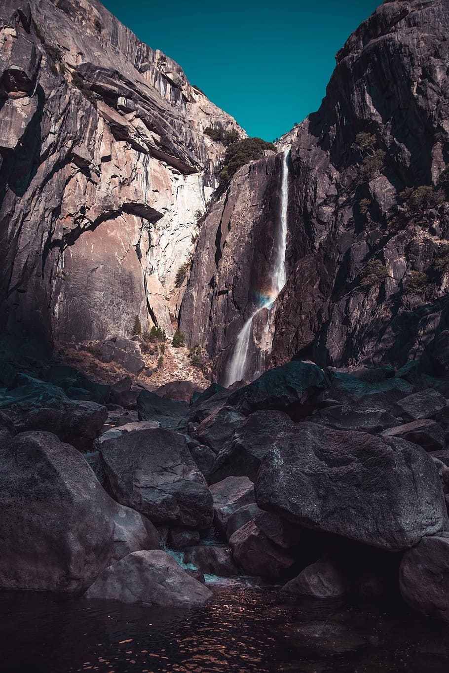 low photo angle of waterfalls, rock mountain during daytime, cliff HD wallpaper