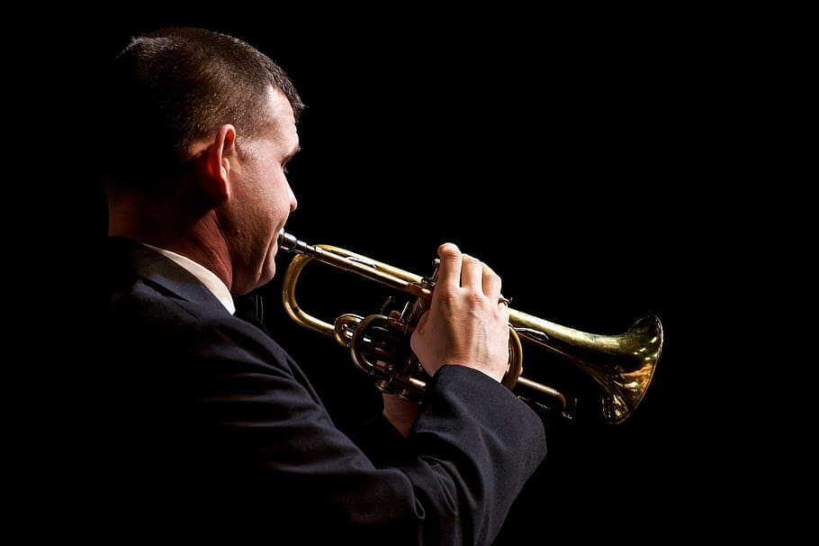 man playing trombone, musician, performance, trumpet, concert