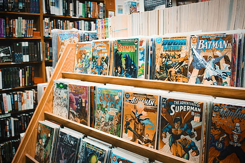 assorted comic book on brown wooden shelf, pile of comic books on wooden rack HD wallpaper