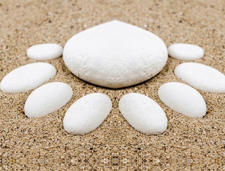round white stone surrounded by pebbles on sand, activity, adventure HD wallpaper
