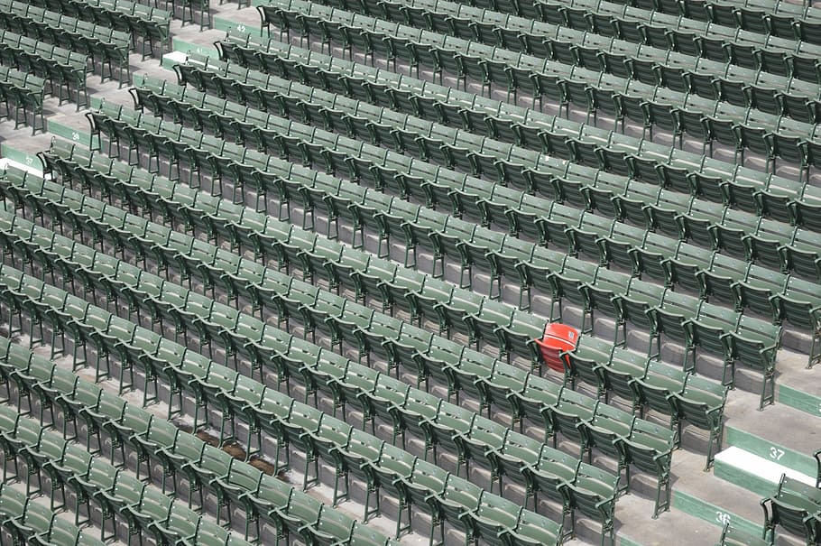 pile of gray plastic folding chairs on gray concrete flooring, bird's eye photography of empty chairs HD wallpaper