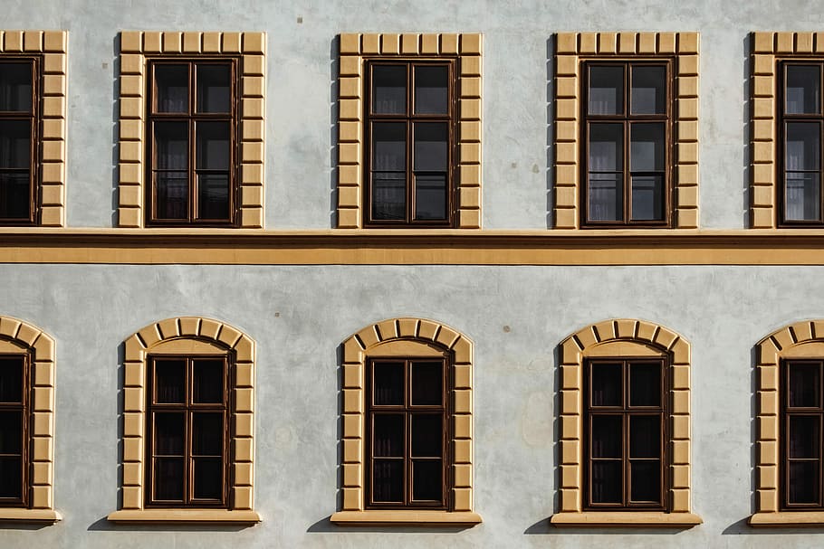 white and brown building, close up photography of gray and brown concrete building HD wallpaper