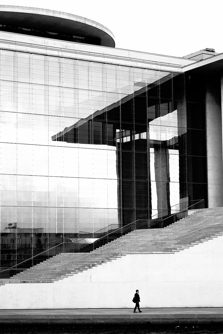 person walking beside white and glass building, buildings, structure HD wallpaper