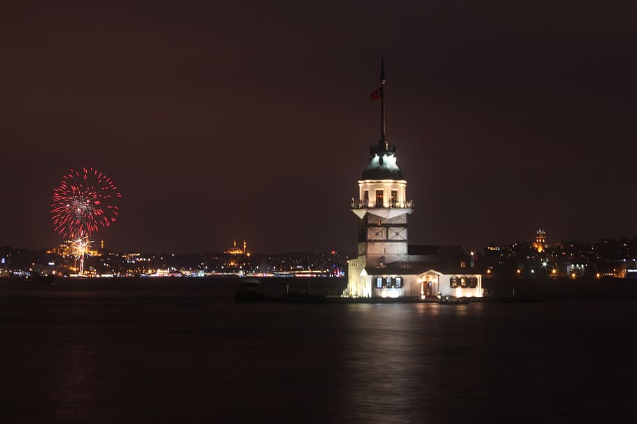 Maiden's Tower, Istanbul, Turkey at night with fireworks at distance, HD wallpaper