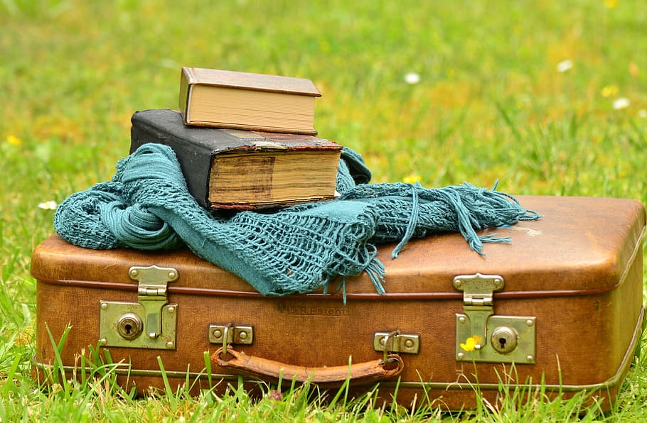 brown leather luggage on top of green grass, leather suitcase HD wallpaper