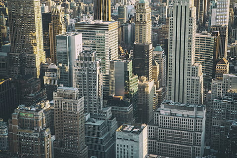 Wide-angle shot of the many high-rise buildings in Manhattan, NYC. This image was captured from the Top Of The Rock observation deck HD wallpaper
