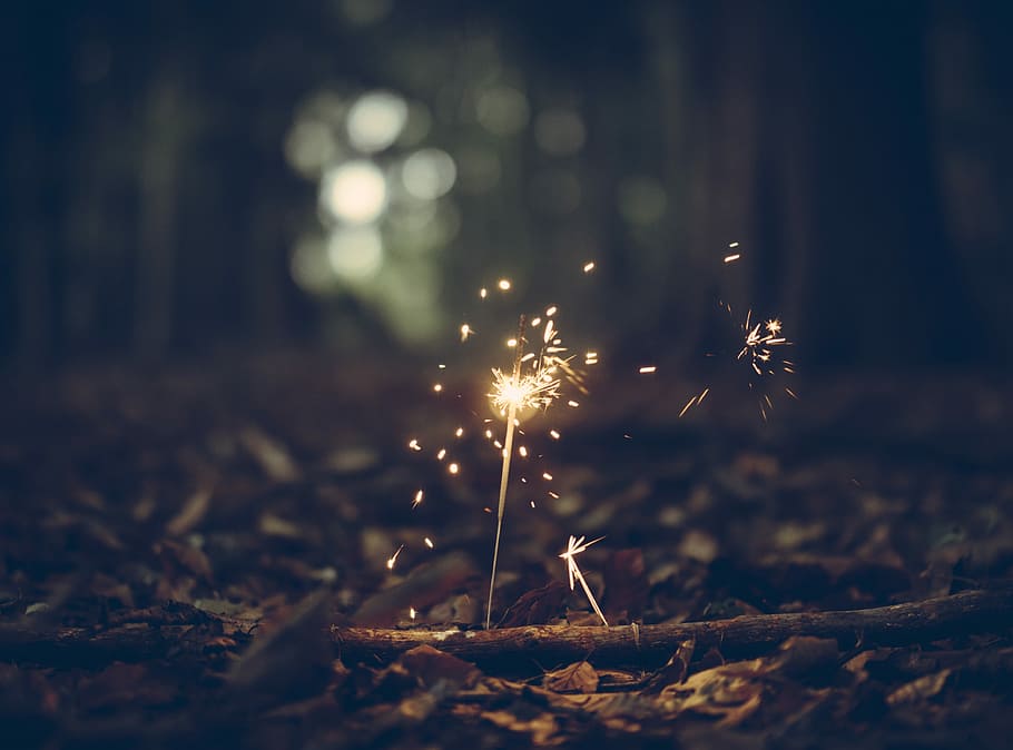 selective focus photography of sparklers, selective focus photography of sparkler on woods HD wallpaper