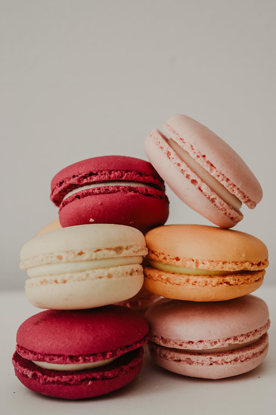 six assorted-color macaroons, assorted-color French macarons