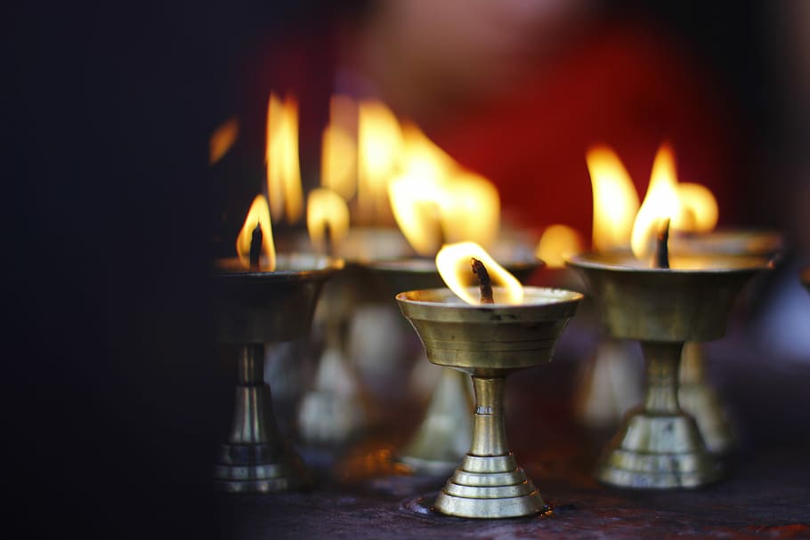 tealight candles burning, shallow focus photography of candles HD wallpaper