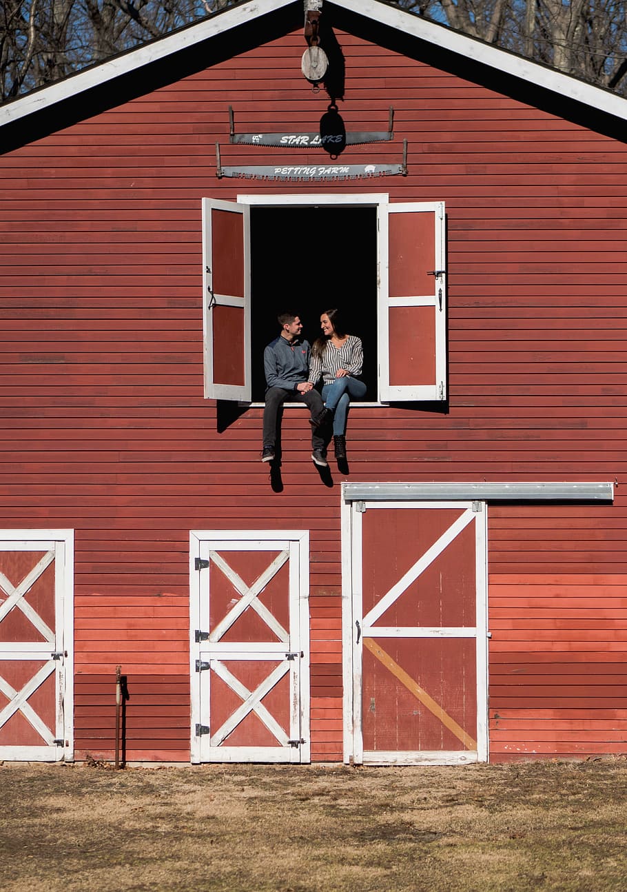 man and woman sitting in stable window, untitled, couple, barn HD wallpaper