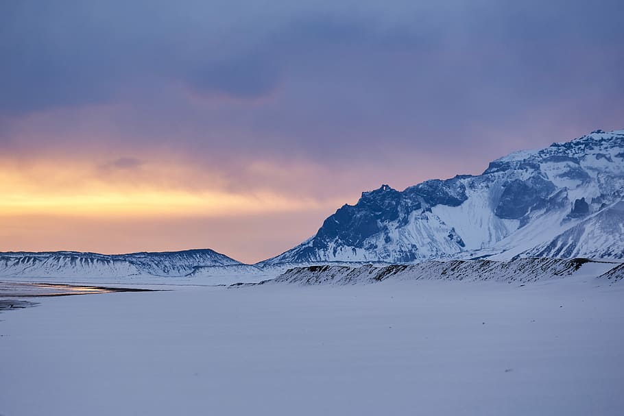 landscape photography of mountain in snow, open field near body of water background of snow coated mountain HD wallpaper