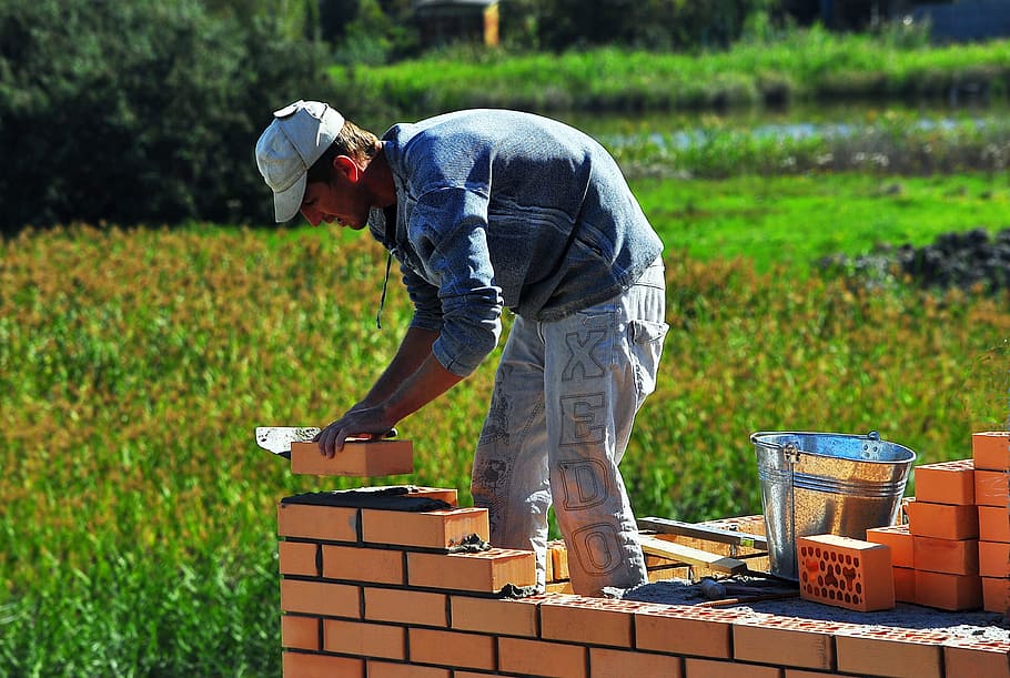 man placing brown bricks during daytime, Mason, Level, working HD wallpaper