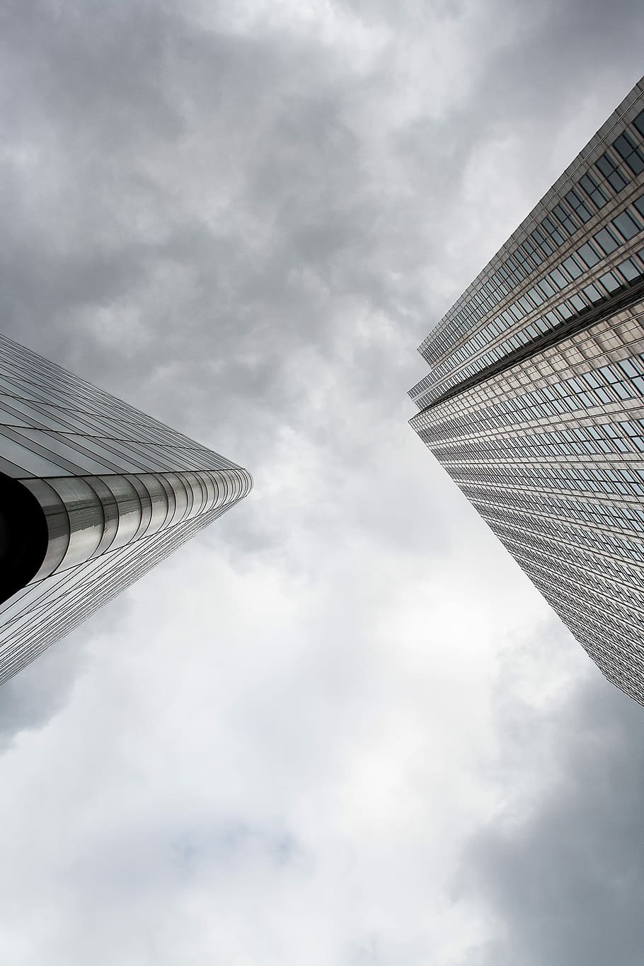 worm eye photography of high-rise building, two tall buildings below gray clouds HD wallpaper